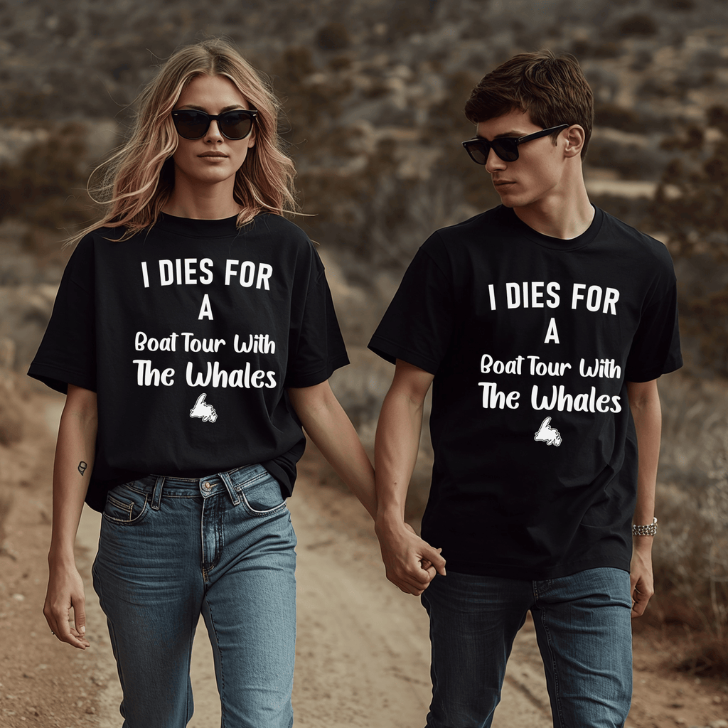 A gorgeous couple wearing t-shirts that say "I Dies for a Boat Tour with the Whales" and has a graphic of Newfoundland.
