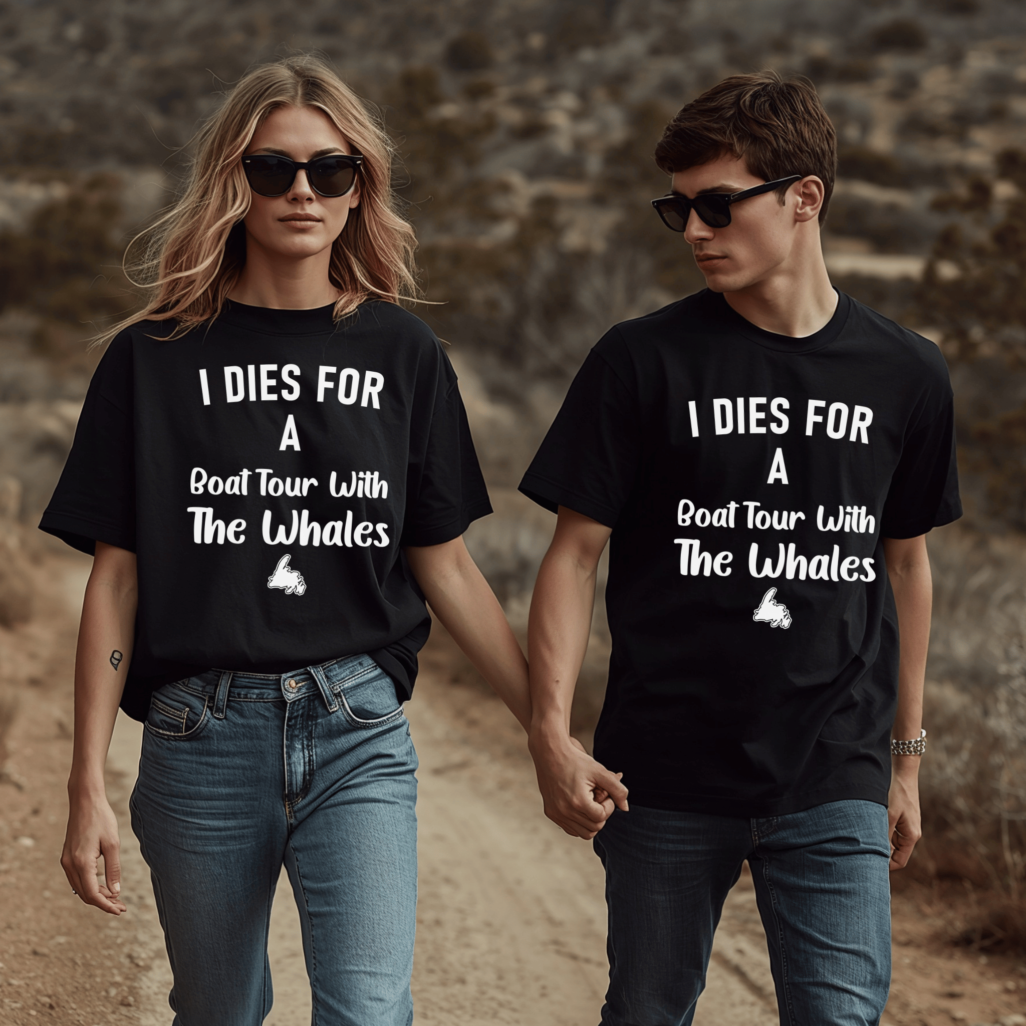 A gorgeous couple wearing t-shirts that say "I Dies for a Boat Tour with the Whales" and has a graphic of Newfoundland.
