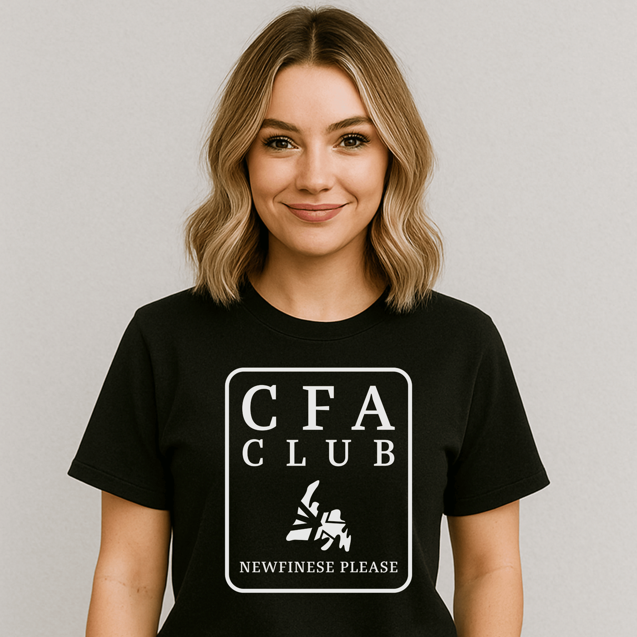 Woman wearing a black t-shirt with 'CFA Club' text, map of Newfoundland, and logo for Newfinese Please on a plain background