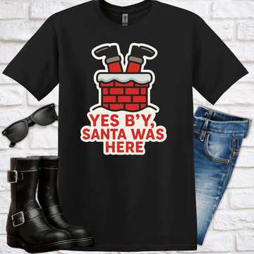 Black t-shirt with 'Yes B'y, Santa Was There" and a graphic of Santa's legs sticking out of a chimney.
