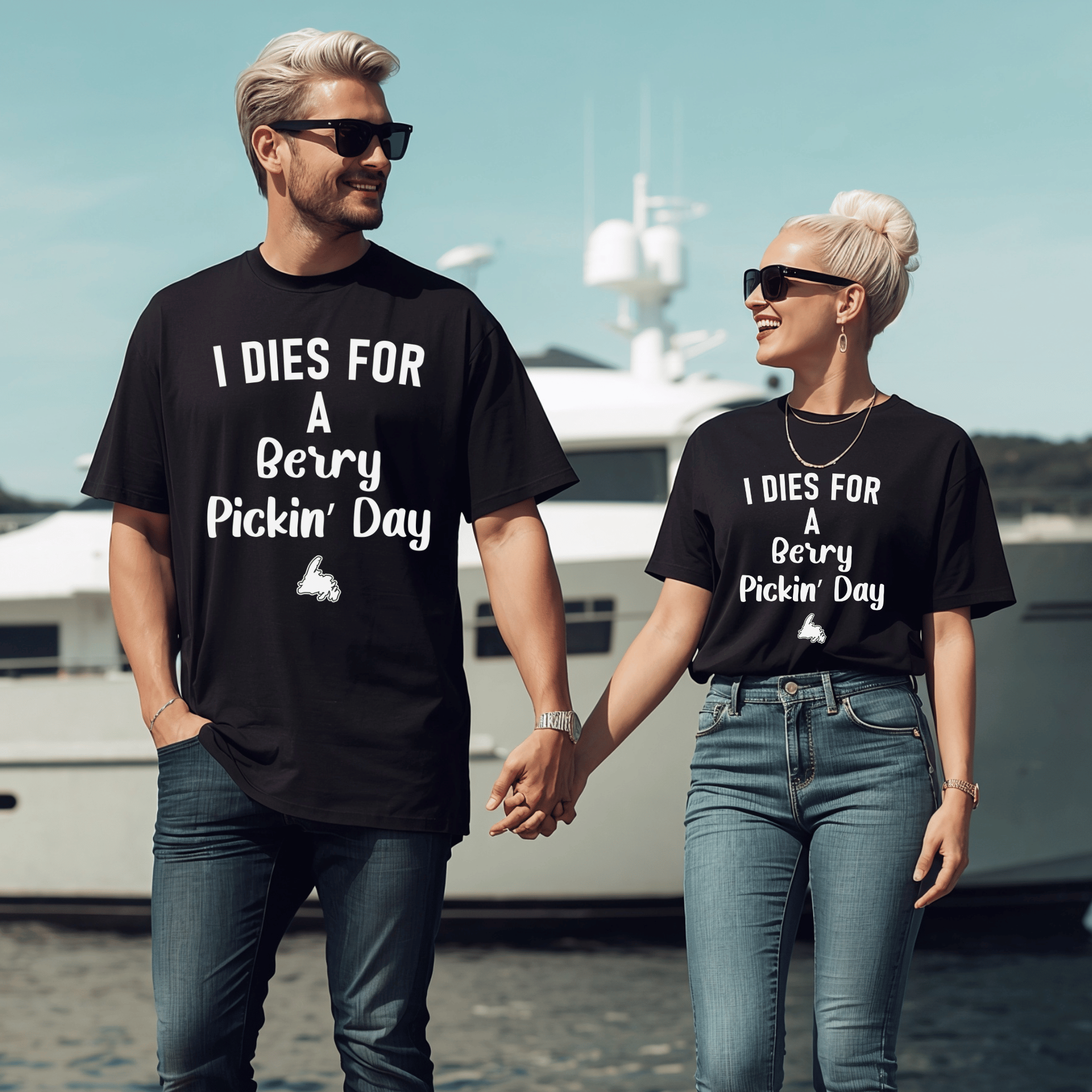 A good-looking couple wearing matching Black t-shirts with white text 'I DIES FOR A Berry Pickin' Day' and a small graphic of Newfoundland.
