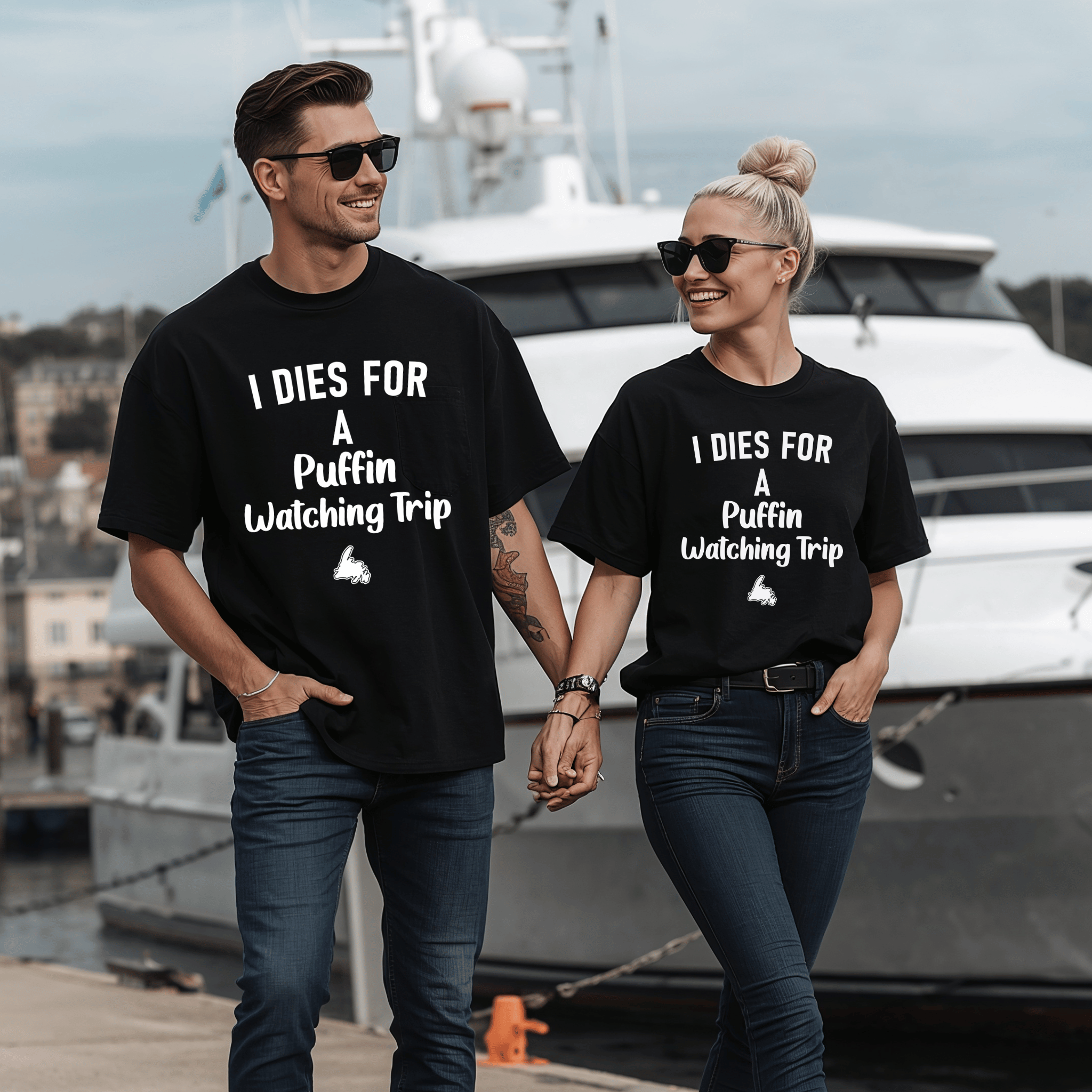 A gorgeous couple wearing matching "I Dies for a Puffin Watching Trip" T-Shirts
