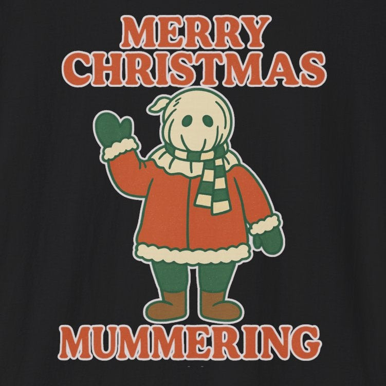 A Newfoundland mummer in costume waving, with the words "Merry Christmas Mummering."
