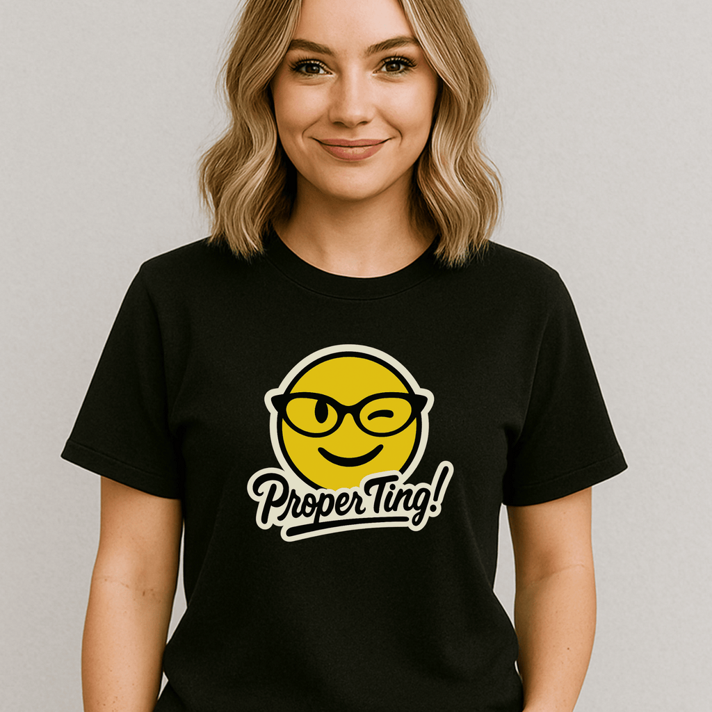 Beautiful lady wearing a black t-shirt with a yellow smiley face wearing cat-eyed glasses and 'Proper Ting!' text on a plain background