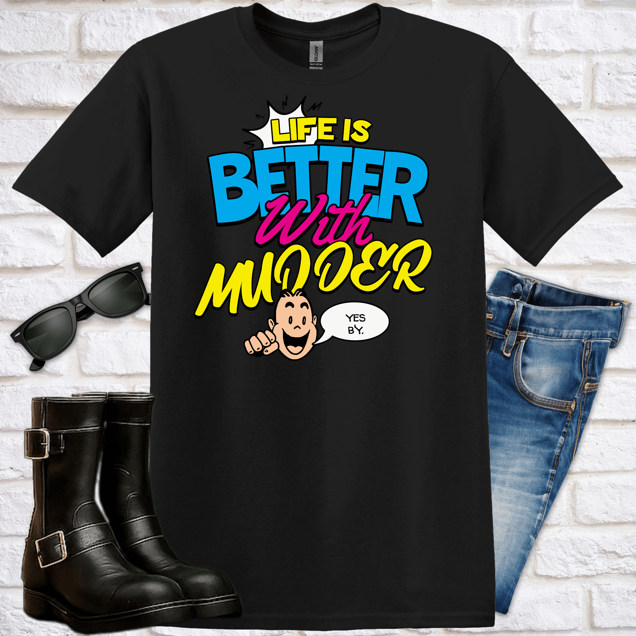 Black t-shirt with funny graphic of a man and text saying "Life is Better with Mudder" with  sunglasses, boots, and jeans on a white brick wall background.