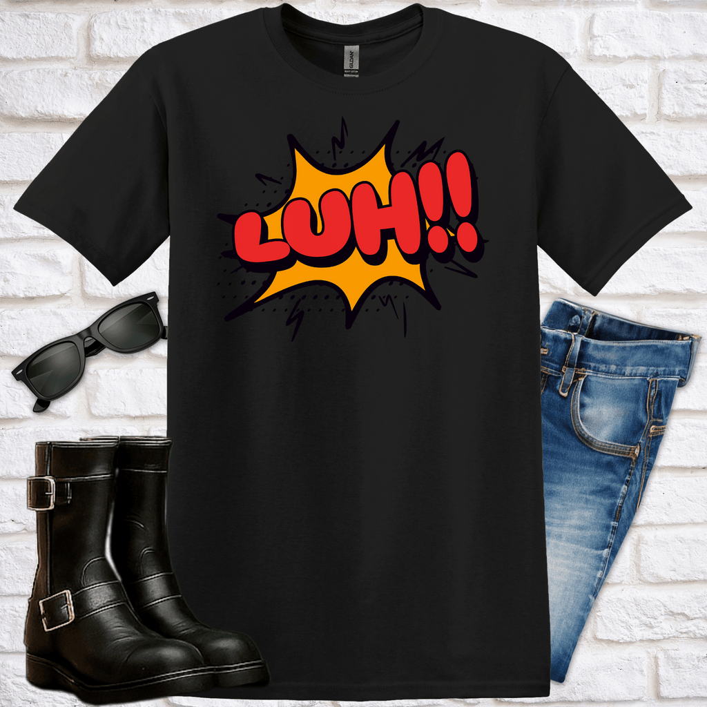 Black t-shirt with comic 'LUH!!' graphic design, sunglasses, boots, and jeans on a white brick wall background.