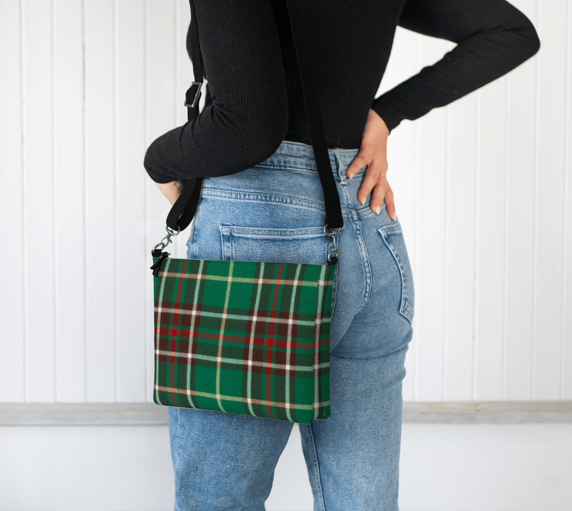 Person wearing the Newfoundland and Labrador Tartan Crossbody Purse over their shoulder against a white background